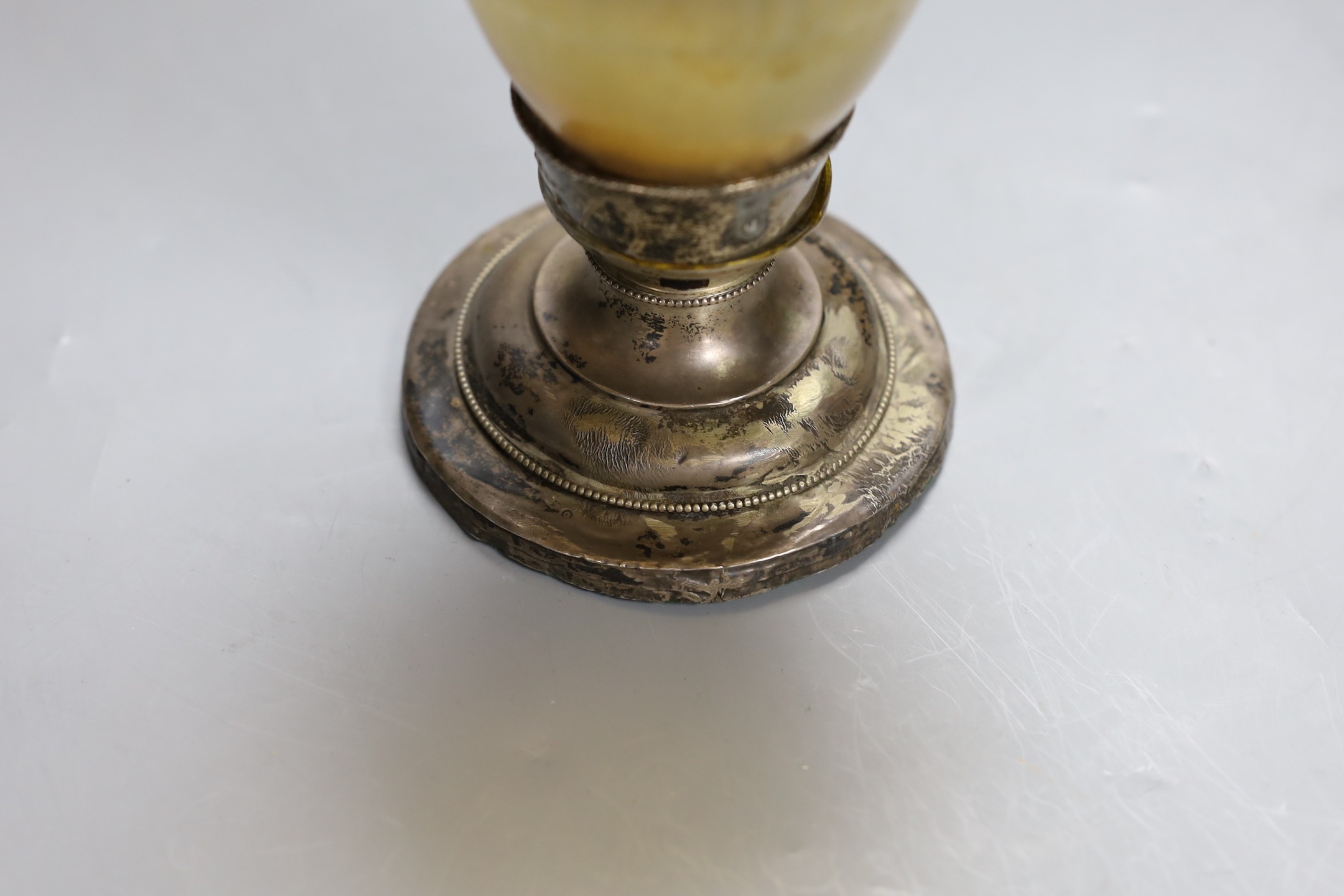 A 19th century and later horn and white metal chalice, 21cm tall